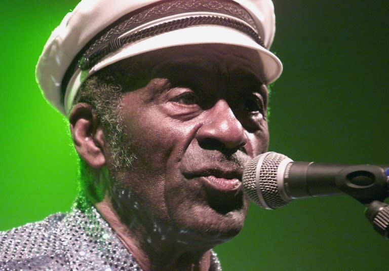 Chuck Berry, pictured in 2003, won cheering crowds with his consummate showmanship, including his "duck walk" across stage, and lyrics that celebrated youthful freedom