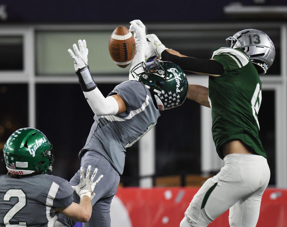 Grafton’s Wesley Williams intercepts a pass intended for Duxbury’s Zachary Falls in the end zone during the third quarter at Gillette Stadium Friday, December 2, 2022.