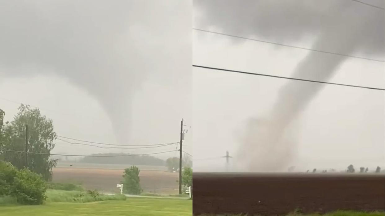 A tornado is seen sweeping through Rigaud, Que., near the Ontario border in southwestern Quebec. (Submitted by Kelly Storm Gagné and Chantal MacKinnon - image credit)