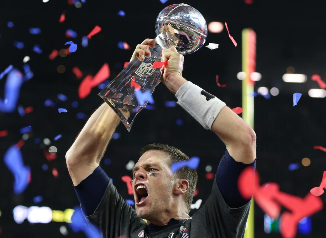 Tom Brady celebrates with the Lombardi Trophy after the Patriots' comeback victory in Super Bowl 51.