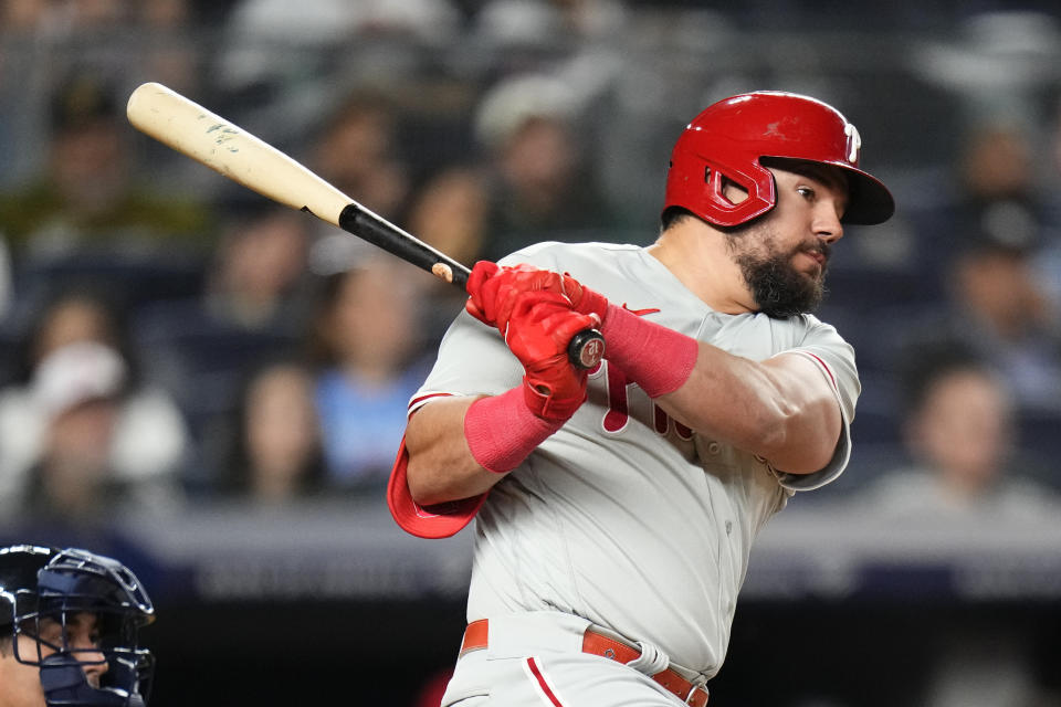 Philadelphia Phillies' Kyle Schwarber follows through on an RBI single during the fifth inning of the team's baseball game against the New York Yankees on Tuesday, April 4, 2023, in New York. (AP Photo/Frank Franklin II)