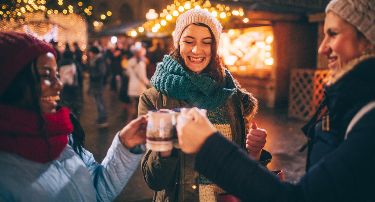 Friends drinking Christmas drinks, to represent calories in them. (Getty Images)