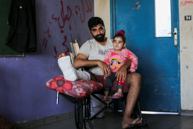 Displaced Palestinian Abu Alkas family take shelter in a school, in Gaza City