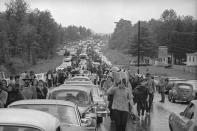 FILE - Hundreds of rock music fans jam highway leading from Bethel, N.Y., Aug. 16, 1969, as they try to leave the Woodstock Music and Art Festival. An estimated 450,000 people attended the Woodstock festival in August 1969, and most of that crowd was composed of teenagers or young adults now in the twilight of their lives. That ticking clock is why the Museum at Bethel Woods, based at the site of the festival, is immersed in a five-year project traveling around the United States recording the oral histories of people were there, preserving the Woodstock memories before they fade away. (AP Photo, File)