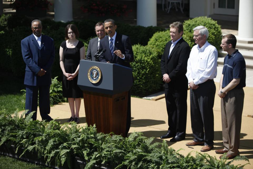 FILE- In this April 30, 2010, file photo, from right, A123 Systems, President and Chief Executive Officer David Vieau, A123 Systems electrical engineer James Fenton and A123 Systems design engineer Antonio Biundo, stand next to President Barack Obama, as he speaks in the Rose Garden of the White House in Washington. Short of cash and hurting from slow sales of electric cars, battery maker A123 Systems Inc. sent its U.S. operations into bankruptcy protection on Tuesday, Oct. 16, 2012, and quickly sold its automotive assets. The filing is likely to stoke the debate in Washington over the Obama administration’s funding of alternative energy companies. In 2009, A123 got a $249 million Department of Energy grant to help it build U.S. factories. Republicans have accused Obama of wasting stimulus money on the companies after the failure of politically connected and now-bankrupt solar power company Solyndra LLC, which left taxpayers on the hook for $528 million. (AP Photo/Haraz N. Ghanbari, File)