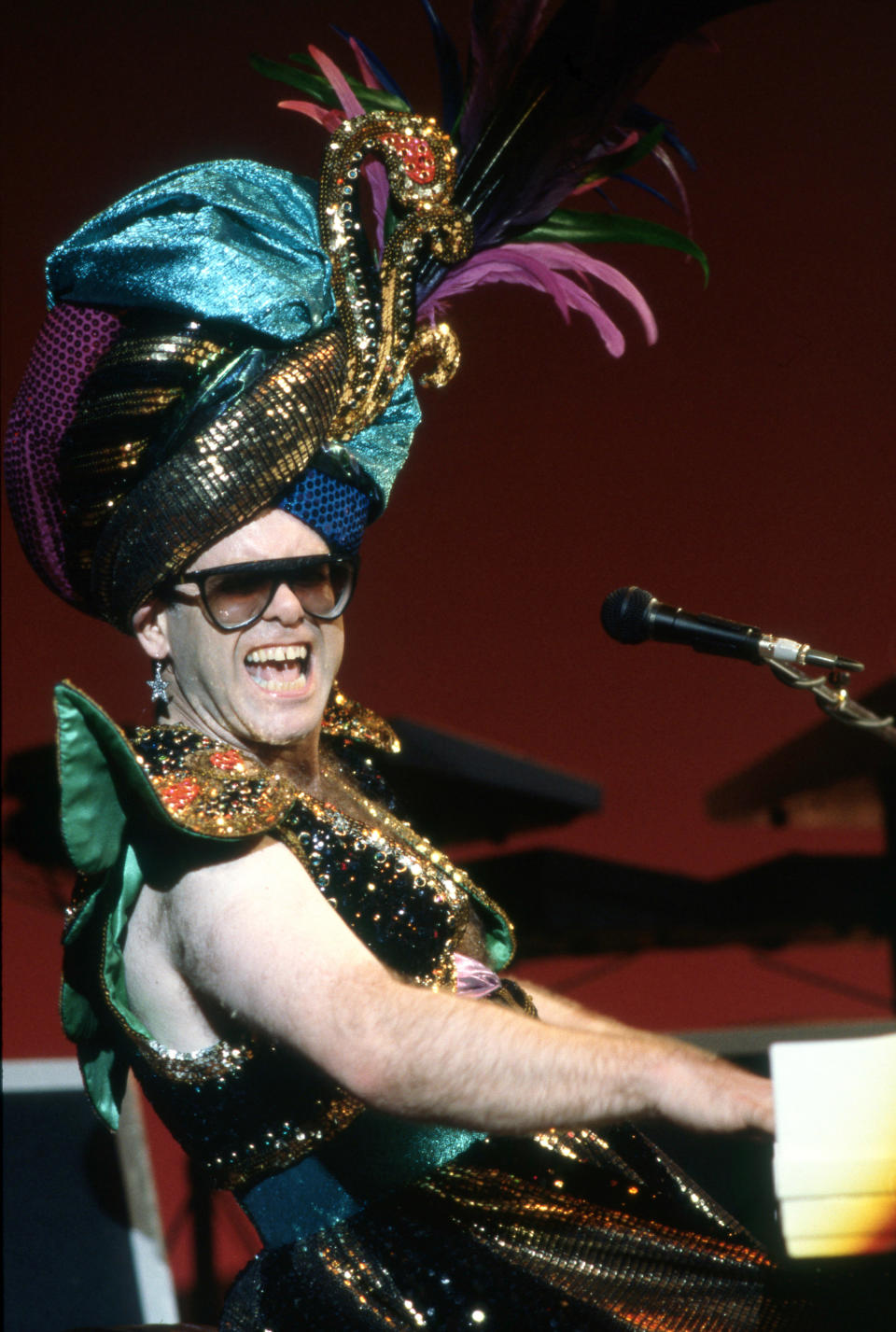 English singer, songwriter, pianist and composer, Sir Elton John, performs at Pine Knob Music Theatre during his "Fire and Ice Tour," on August 18, 1986