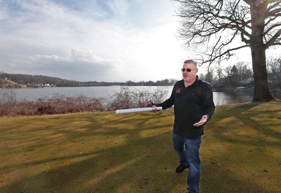 Tim Adkins, owner of Turkeyfoot Lake Golf Links, talks in late February about the housing development he is planning on a portion of the golf course near Mud Lake in New Franklin.