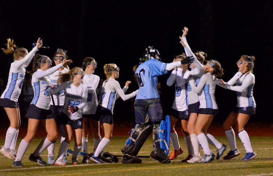 CANTON -- 11/16/22 -- Sandwich players celebrate their win over Newburyport. 
Sandwich High School played Newburyport High School in Division 3 state semifinal field hockey action Wednesday at Canton High School. Sandwich won 1-0.