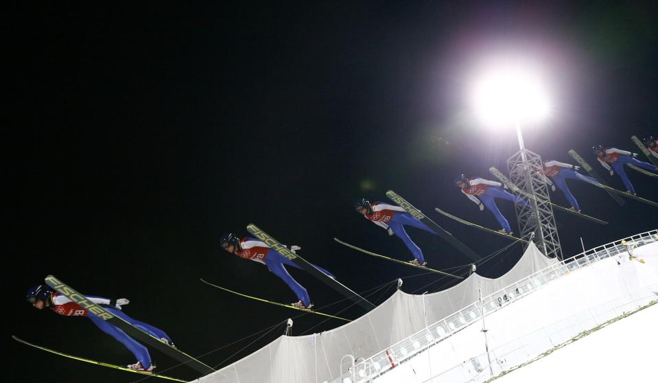 A picture taken with the multiple exposure function of the camera shows Daniela Iraschko Stolz from Austria soaring through the air during the women's ski jumping individual normal hill training event of the Sochi 2014 Winter Olympic Games, at the RusSki Gorki Ski Jumping Center in Rosa Khutor February 10, 2014. REUTERS/Kai Pfaffenbach
