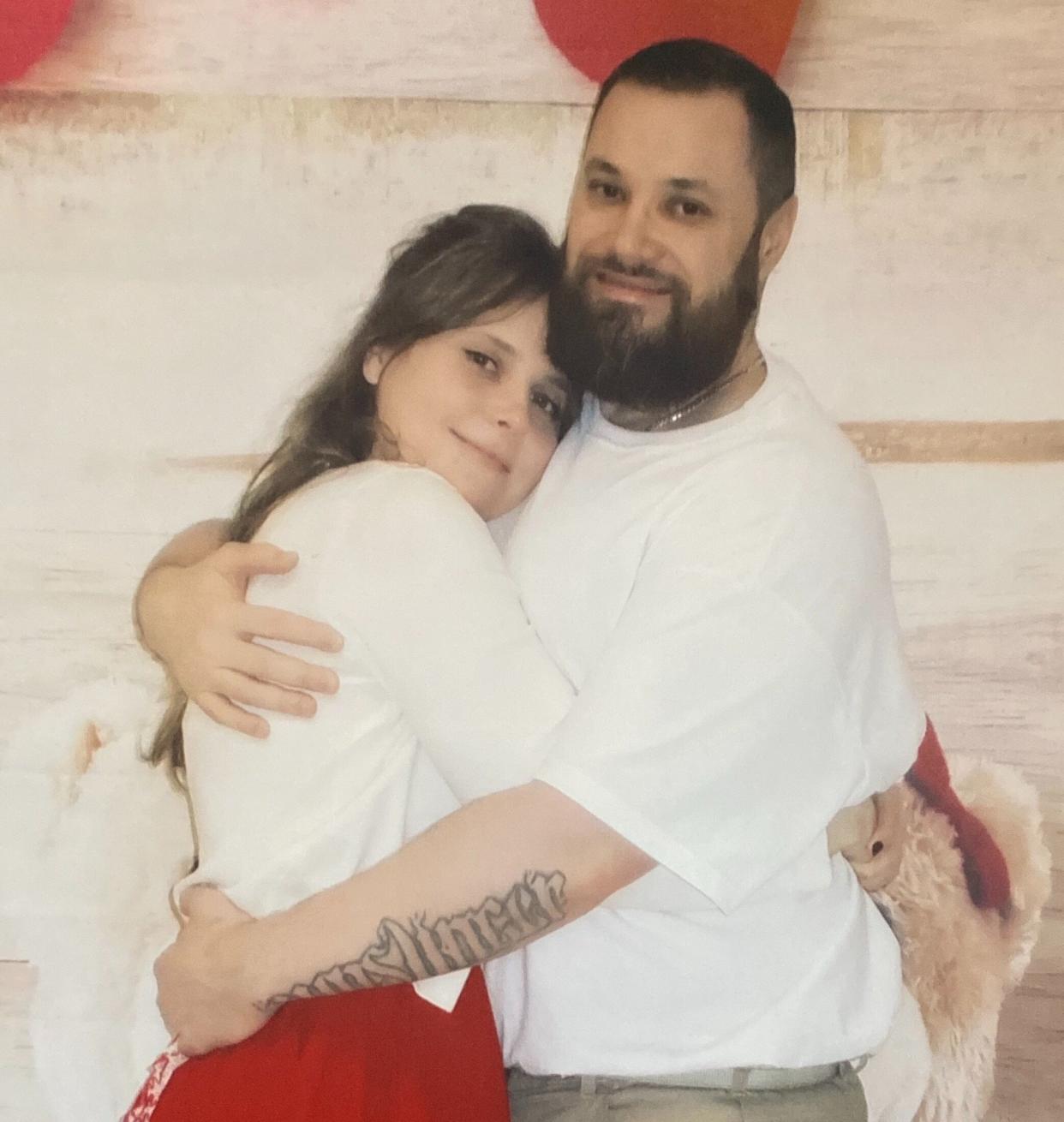 The author and her husband in the prison visit room before visits closed indefinitely due to COVID-19. (Photo: Courtesy of Chelsea Moore)