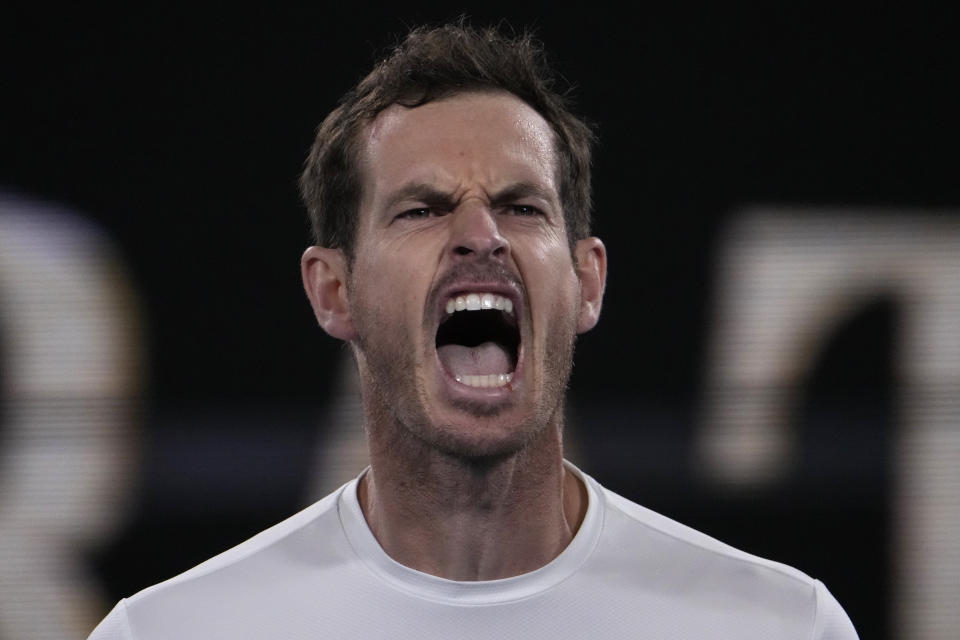 Andy Murray of Britain reacts after defeating Thanasi Kokkinakis of Australia at the Australian Open tennis championship in Melbourne, Australia, Friday, Jan. 20, 2023. (AP Photo/Ng Han Guan)