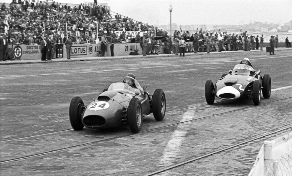 Mike Hawthorn leads Stirling Moss over cobblestones and tram tracks in Boavista.