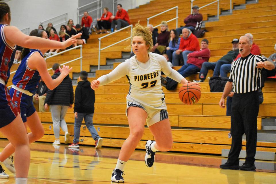 Mooresville's Rachel Harshman takes a step-back during the Pioneers' sectional matchup against rival Martinsville on Feb. 3, 2023.