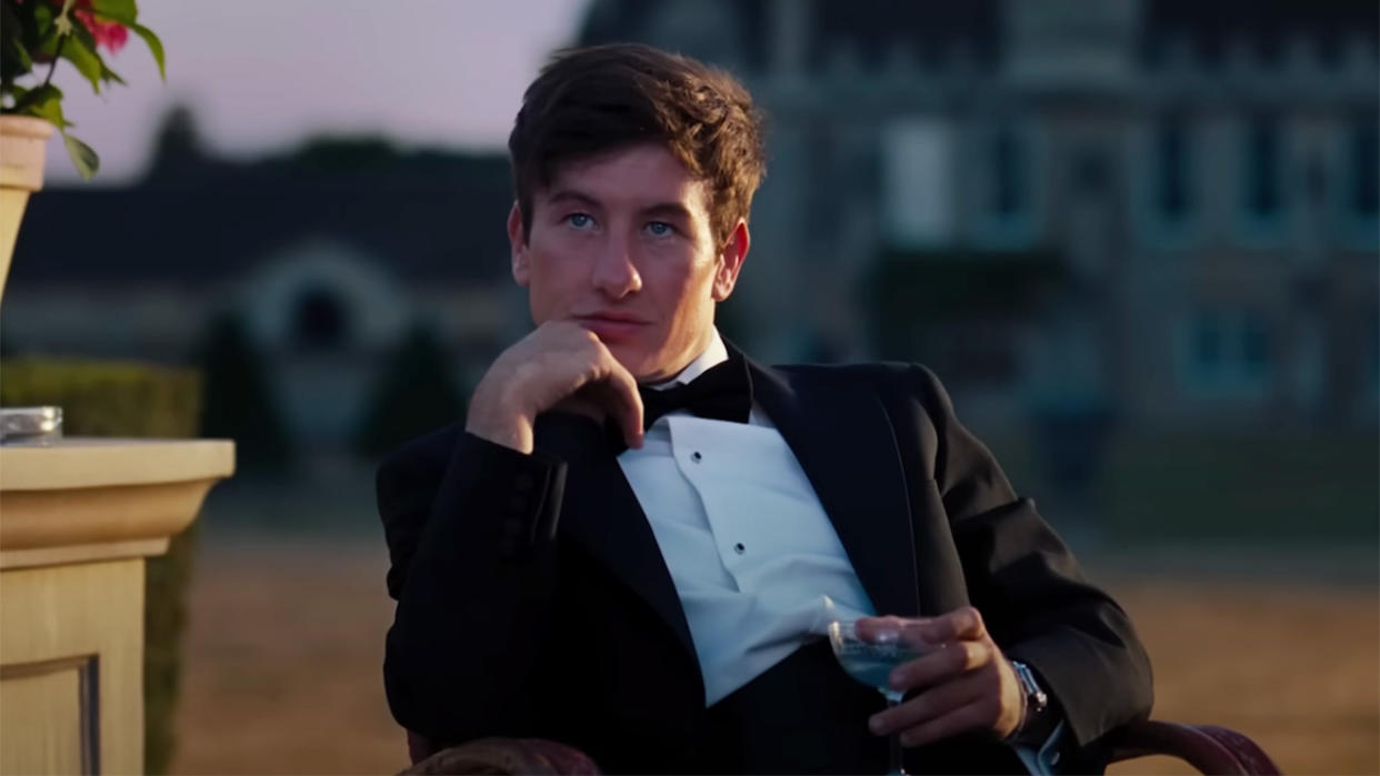  Barry Keoghan as Oliver Quick in a suit outside of Saltburn. . 