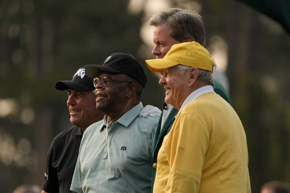 From left, Gary Player, Lee Elder, Fred Ridley, chairman of Augusta National Golf Club and the Masters Tournament and Jack Nicklaus pose after the ceremonial first tees during the first round of the Masters golf tournament on Thursday, April 8, 2021, in Augusta, Ga. (AP Photo/Gregory Bull)