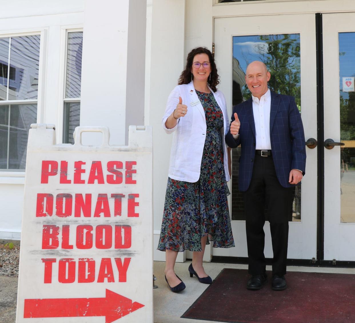 Stephanie Couturier, regional chief executive officer of the American Red Cross, left, and Todd Selig, Durham's town administrator, are seen at the Durham donation site May 25, 2022, for the recent blood drive challenge. Durham won the challenge over Dover and Newmarket.