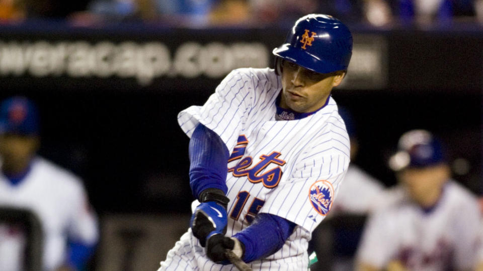 Oct 18, 2006; Flushing, NY, USA; New York Mets center fielder (15) Carlos Beltran singles in the fourth inning of game six of the National League Championship Series against the St. Louis Cardinals at Shea Stadium in Flushing, NY.