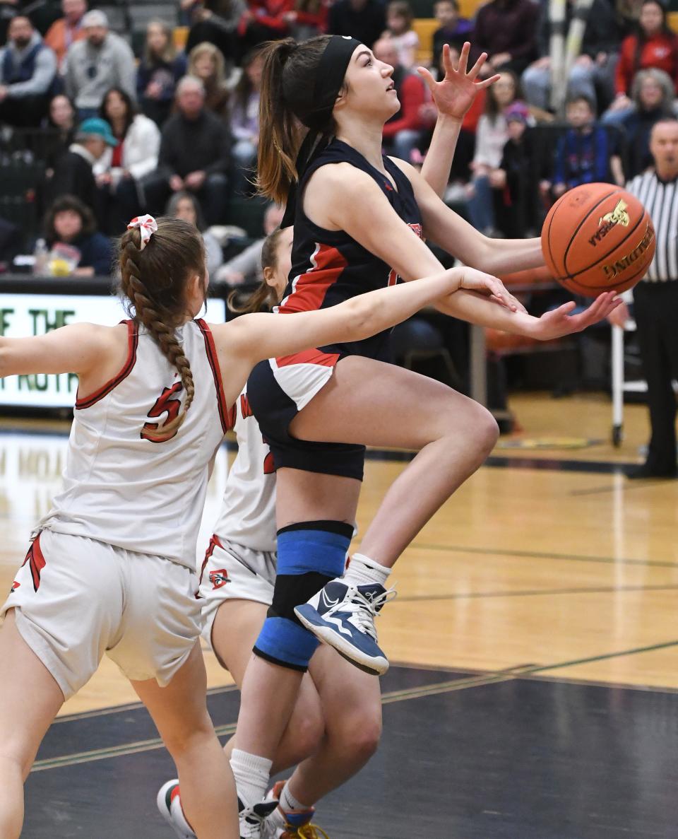 Hornell's Payton Bentley goes in for a lay up against Dansville during the Section V Class B2 championship March 4, 2023.