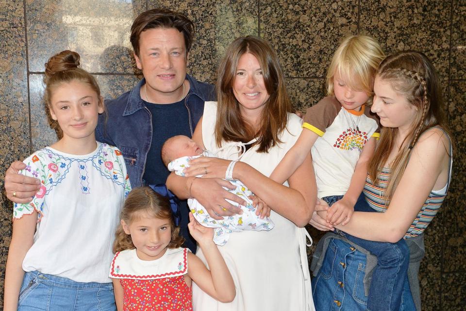 Jamie Oliver with his wife Jools and their five children who also appear in the documentary (PA Archive/PA Images)