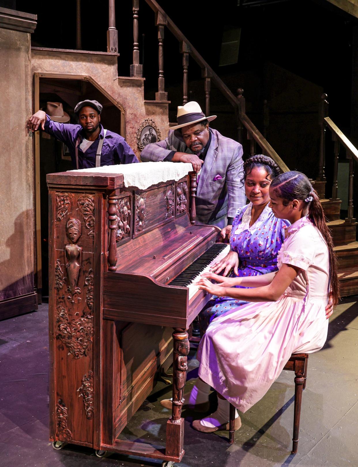 August Wilson’s "The Piano Lesson" features (from left) Emmett Saah Phillips Jr., Aaron Smith, Tiffany Johnson, and Larryah Travis. The show is a co-production of Pyramid Theatre Co. and The Des Moines Playhouse, performed at The Playhouse Feb. 3-19, 2023.
