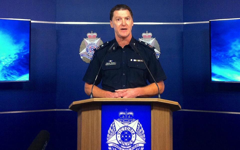 Victoria state police deputy commissioner Shane Patton announces the charges against the Vatican's treasurer, Australian Cardinal George Pell - Credit: Reuters