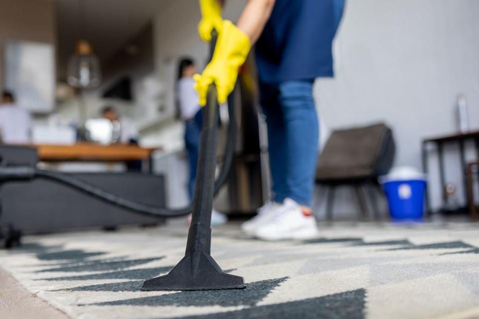 <p>Getty</p> Stock image of housekeeper cleaning