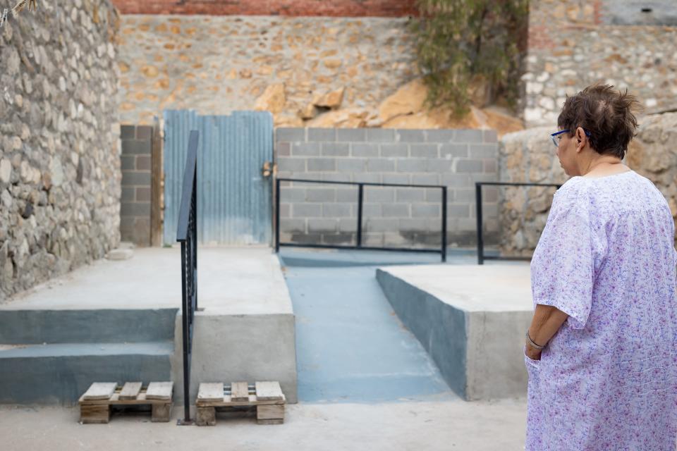 Rosa Adame shows a ramp on Thursday, Nov. 16, built for her and her sister Maria Adame by the Rio Grande Area Agency on Aging using Senior Fund holiday donations. The ramp helps the sisters safely enter their home, which is built on a hill.