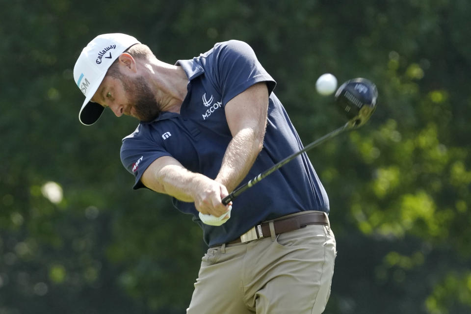 Chris Kirk strikes his tee shot on the seventh hole during the second round of the BMW Championship golf tournament, Friday, Aug. 18, 2023, in Olympia Fields, Ill. (AP Photo/Charles Rex Arbogast)