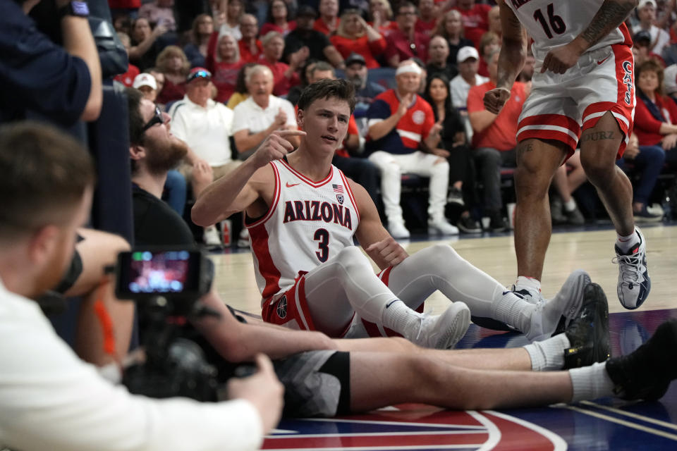Arizona guard Pelle Larsson (3) reacts after getting fouled during the second half of an NCAA college basketball game against Washington, Saturday, Feb. 24, 2024, in Tucson, Ariz. (AP Photo/Rick Scuteri)