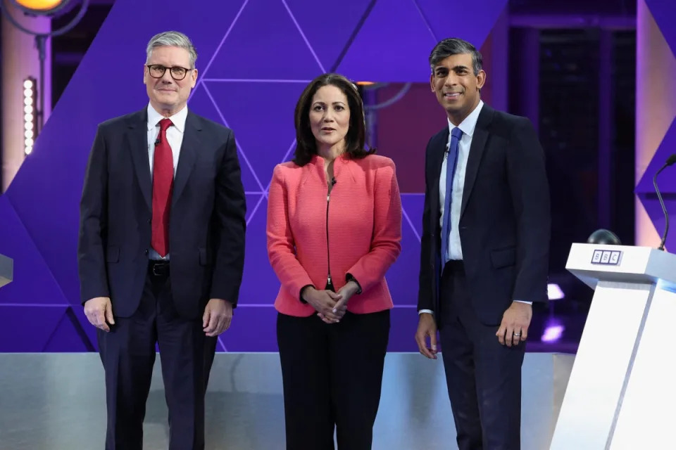 Mishal Husain with Labour leader Sir Keir Starmer and Prime Minister Rishi Sunak before their BBC Head-to-head debate (PA)