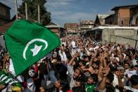 FILE PHOTO: Kashmiris attend a protest after Eid-al-Adha prayers at a mosque in Srinagar