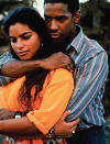<p><b>12. Denzel Washington & Sarita Choudhury, 'Mississippi Masala' (1991)</b> <br>At one point in this timeless love story, Denzel’s character says: "Hot and spicy, Miss Masala -- that's what I'm going to call you," and henceforth begins the love story of a Ugandan Indian girl and an African American boy whose families abhor their relationship. A ‘Romeo and Juliet’ for the 90’s, but without the tragic end.</p>
