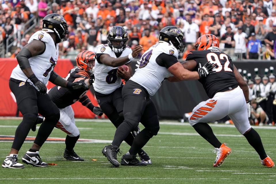 Baltimore Ravens quarterback Lamar Jackson (8) carries the ball in the second quarter of a Week 2 NFL football game between the Baltimore Ravens and the Cincinnati Bengals Sunday, Sept. 17, 2023, at Paycor Stadium in Cincinnati.