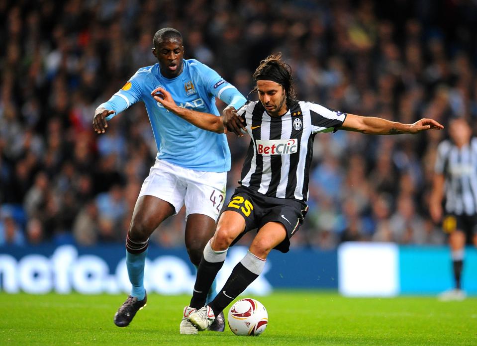 Juventus's Jorge Martinez (right) and Manchester City's Gnegneri Toure Yaya battle for the ball