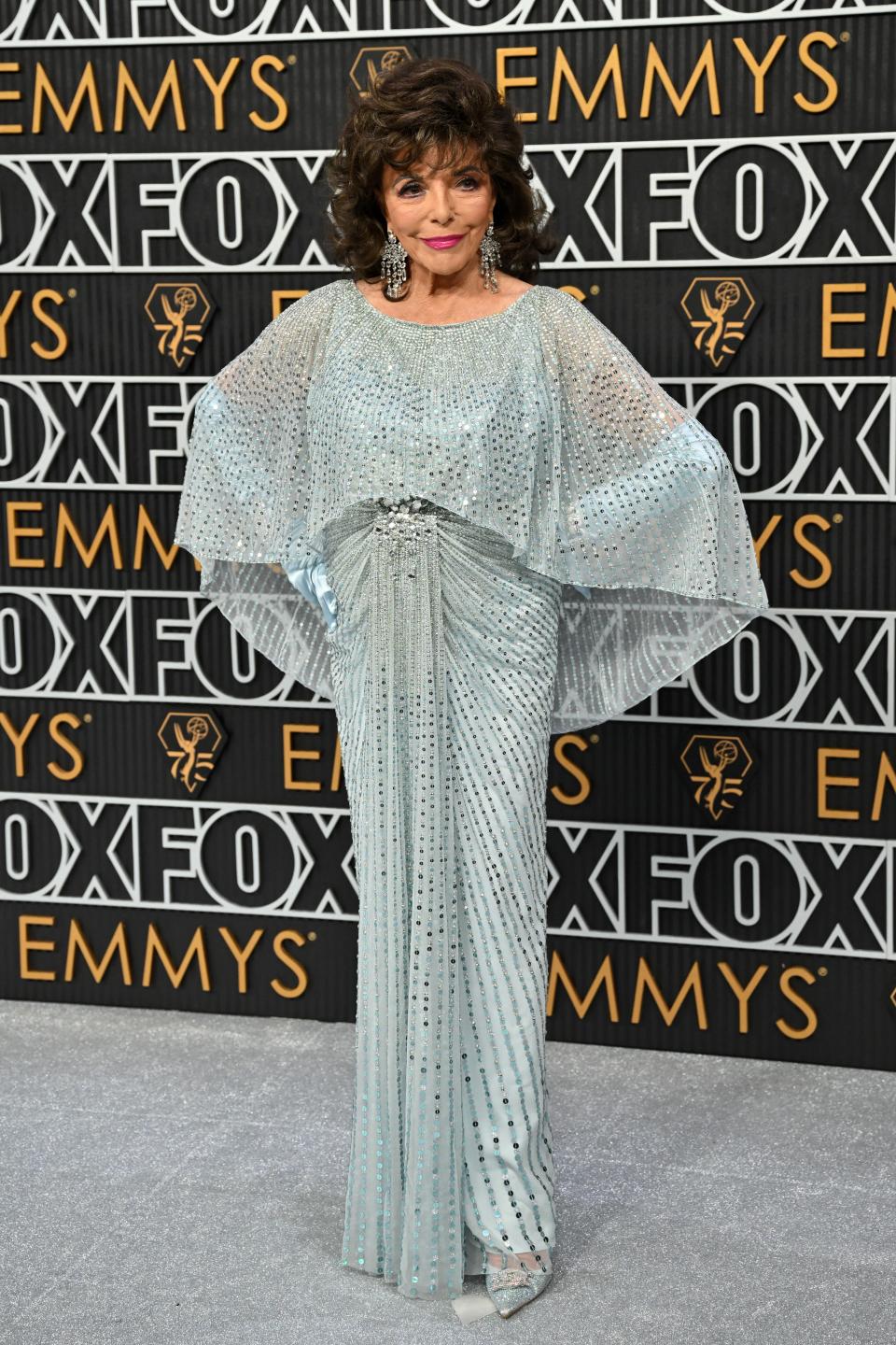 Joan Collins in Jenny Packham