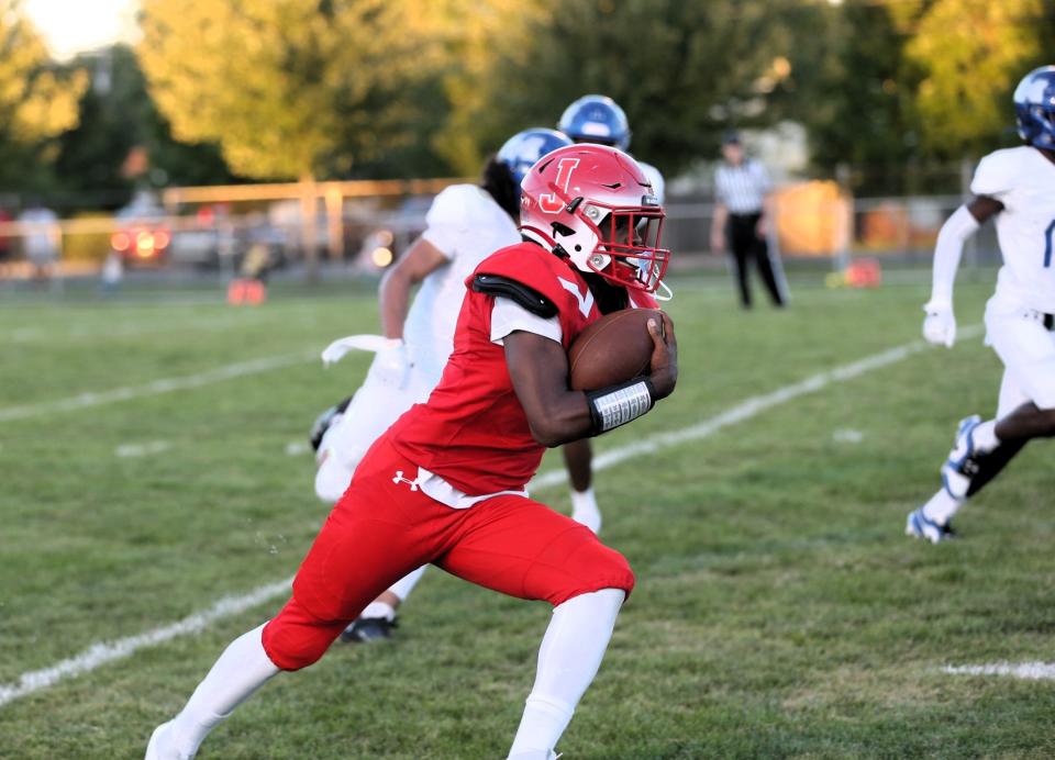 Jacksonville's Cam'Ron Mitchell returns a punt for a touchdown against Decatur MacArthur during the first quarter of a Central State Eight Conference football game at Kraushaar-Rosenberger Field on Friday, Sept. 1, 2023.