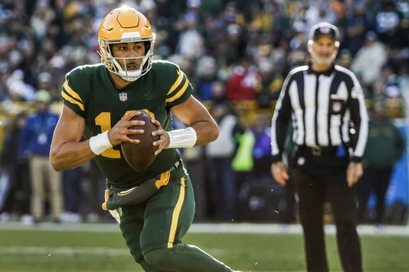 Green Bay Packers quarterback Jordan Love scrambles against the Los Angeles Chargers on Sunday at Lambeau Field in Green Bay, Wis. Photo by Tannen Maury/UPI