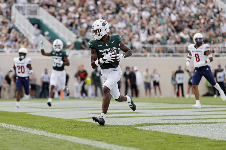 Michigan State receiver Tre Mosley catches a touchdown pass in the first quarter against the Richmond Spiders at Spartan Stadium on Sept. 9, 2023 in East Lansing.