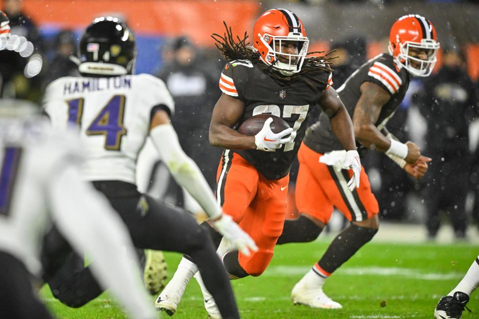 Cleveland Browns running back Kareem Hunt carries the ball during the second half of an NFL football game against the Baltimore Ravens, Saturday, Dec. 17, 2022, in Cleveland. (AP Photo/David Richard)