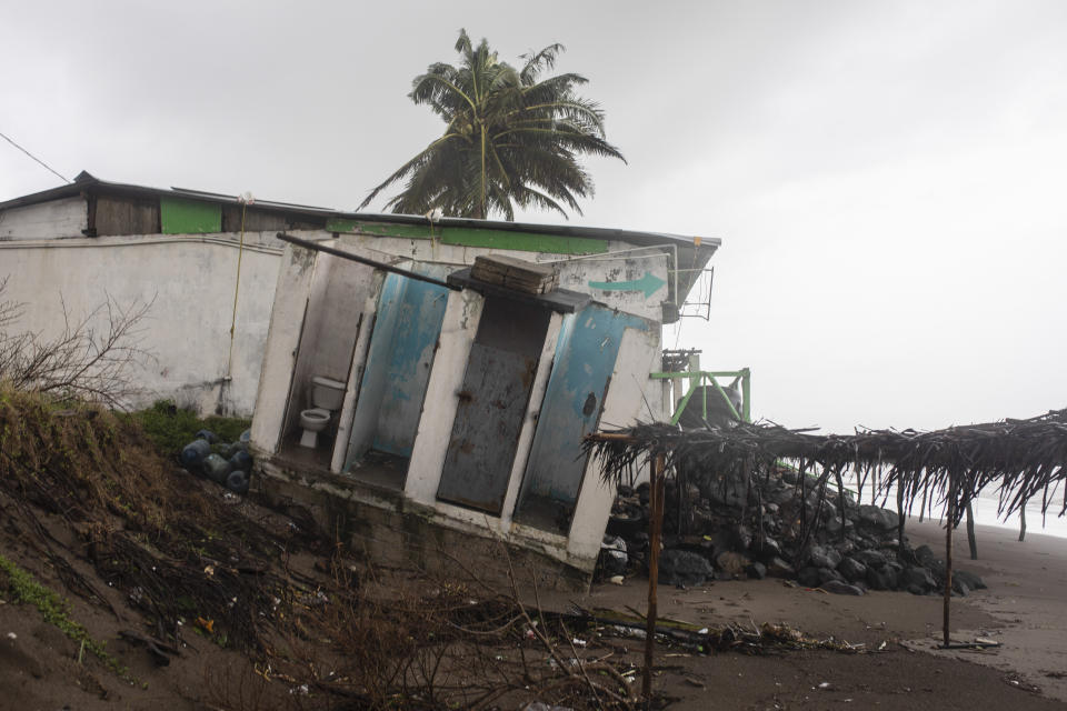 A home damaged by winds brought on by Hurricane Grace sits askew near the shore, in Tecolutla, Veracruz State, Mexico, Saturday, Aug. 21, 2021. Grace hit Mexico’s Gulf shore as a major Category 3 storm before weakening on Saturday, drenching coastal and inland areas in its second landfall in the country in two days. (AP Photo/Felix Marquez)