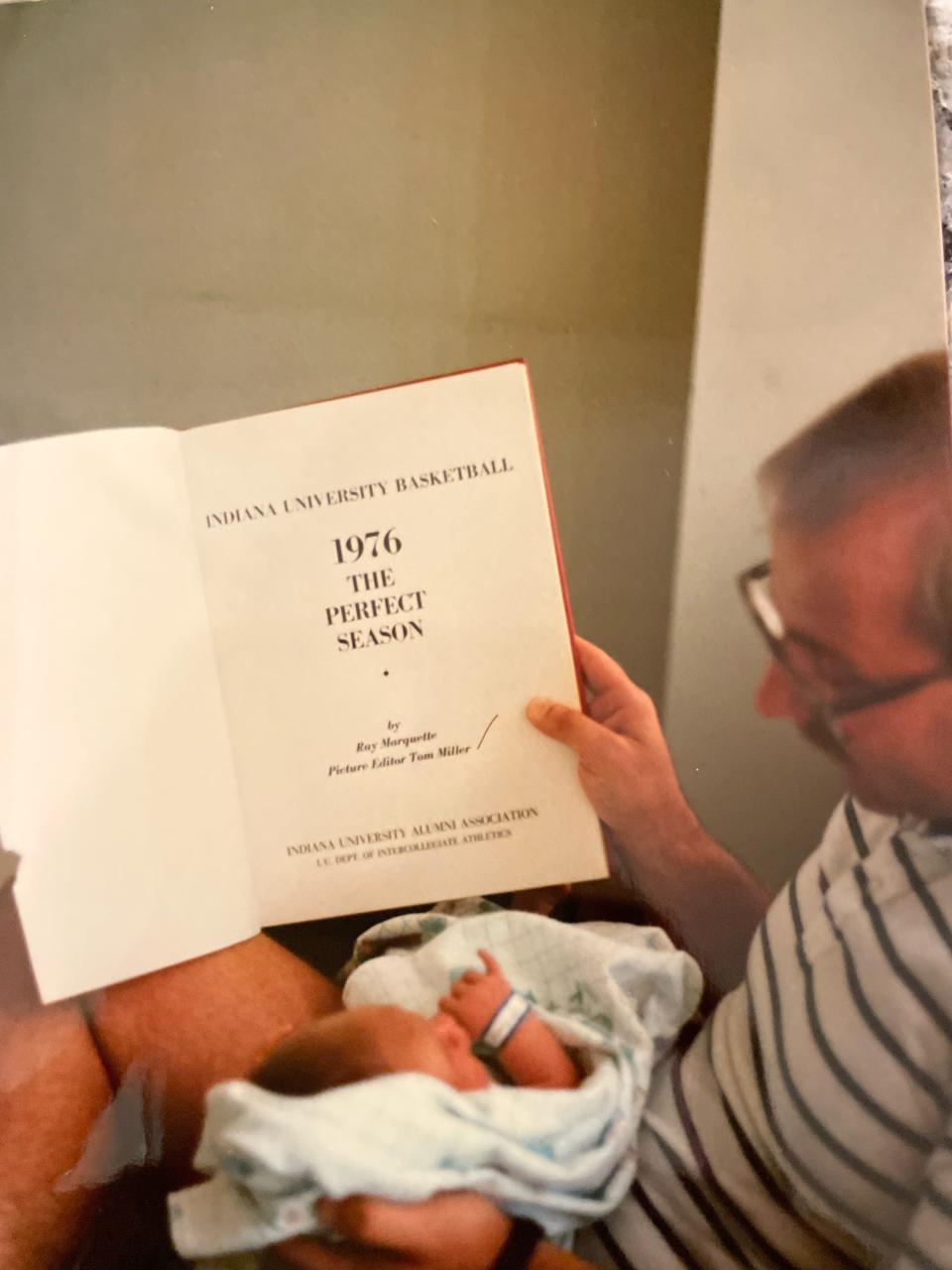 Carlye Frye's father reads "1976 The Perfect Season."