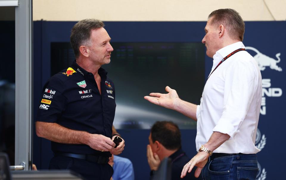 Oracle Red Bull Racing team principal Christian Horner talks to Jos Verstappen in the Paddock ahead of practice ahead of the F1 Bahrain Grand Prix at the Bahrain International Circuit on February 29, 2024 in Bahrain, Bahrain