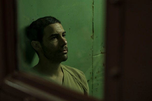 Mohamedou Ould Slahi (played by Tahar Rahim) was imprisoned for 14 years at the Guantanamo Bay Detention Camp.