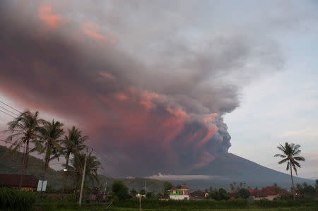 Mount Agung volcano erupts as seen from Culik Village, Karangasem, Bali, Indonesia November 26, 2017 in this photo taken by Antara Foto. Antara Foto/Nyoman Budhiana/ via REUTERS