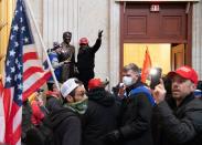 Supporters of US President Donald Trump enter the US Capitol's Rotunda on January 6, 2021, in Washington, DC. - Demonstrators breeched security and entered the Capitol as Congress debated the a 2020 presidential election Electoral Vote Certification. (Photo by SAUL LOEB / AFP) (Photo by SAUL LOEB/AFP via Getty Images)