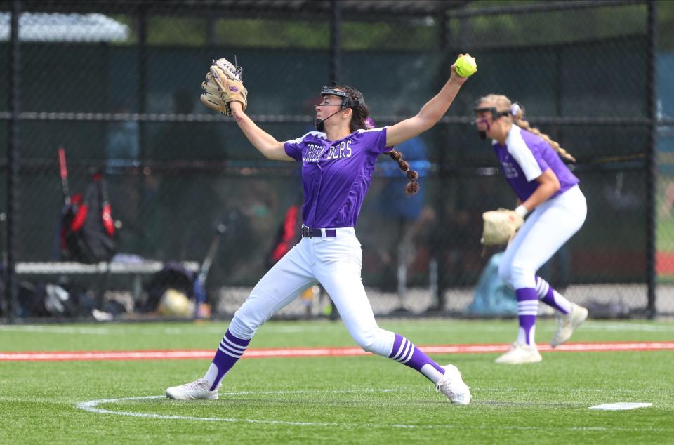 Monroe-Woodbury's Brianna Roberts (14) delivers a pitch in the NYSPHSAA Class AA semifinal against Lancaster at Moriches Athletic Complex in Moriches on Saturday, June 11, 2022.   Monroe-Woodbury won 4-3.