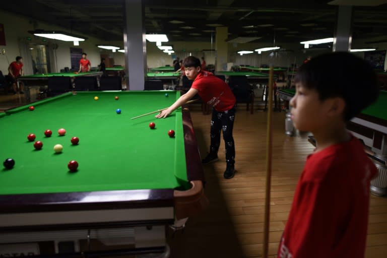 The snooker academy's 24 students hail from across China and are foregoing traditional schooling