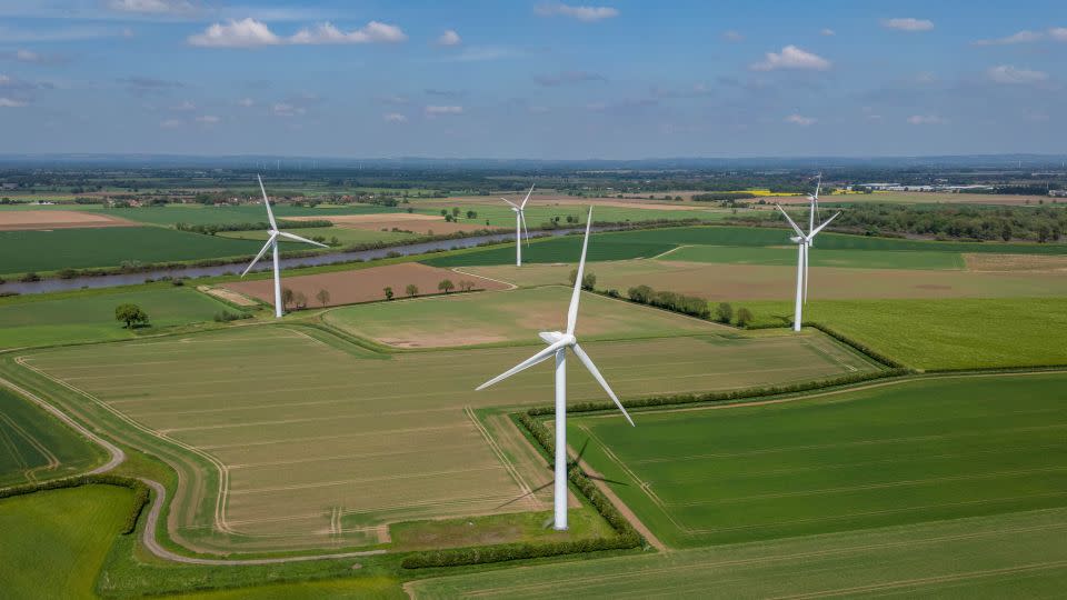 Wind turbines in a field near Selby, UK in May, 2024. The Labour Party hopes to unleash private investment into the clean energy transition. - Dominic Lipinski/Bloomberg/Getty Images