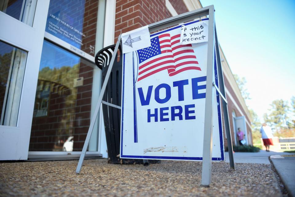 A vote here sign sits outside the Columbia County Library on Tuesday, Nov. 8, 2022. 