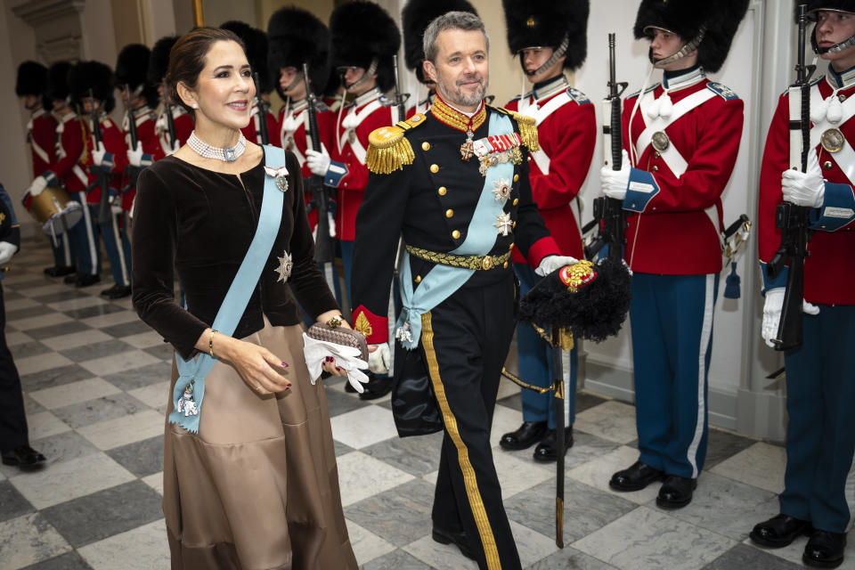 Denmark's Crown Prince Frederik and Crown Princess Mary arrive to the traditional New Year’s fete with officers from the Armed Forces, and the National Emergency Management Agency, as well as invited representatives of major national organizations and the royal patronage at Christiansborg Castle in Copenhagen, Denmark, Thursday Jan. 4, 2024. (Mads Claus Rasmussen/Ritzau Scanpix via AP)